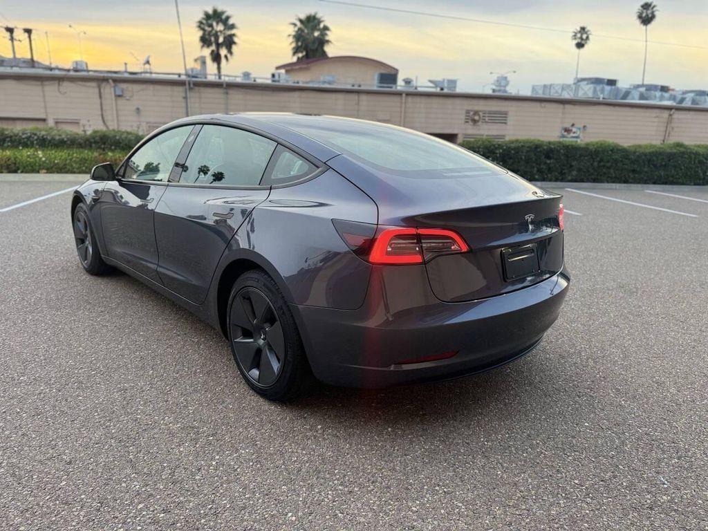 used 2023 Tesla Model 3 car, priced at $21,999