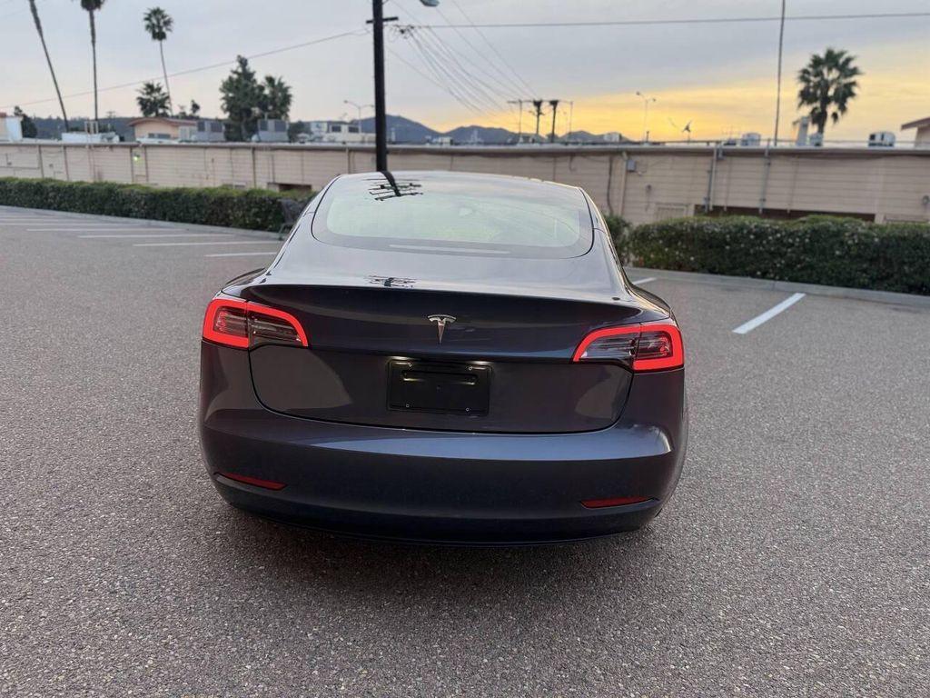 used 2023 Tesla Model 3 car, priced at $21,999