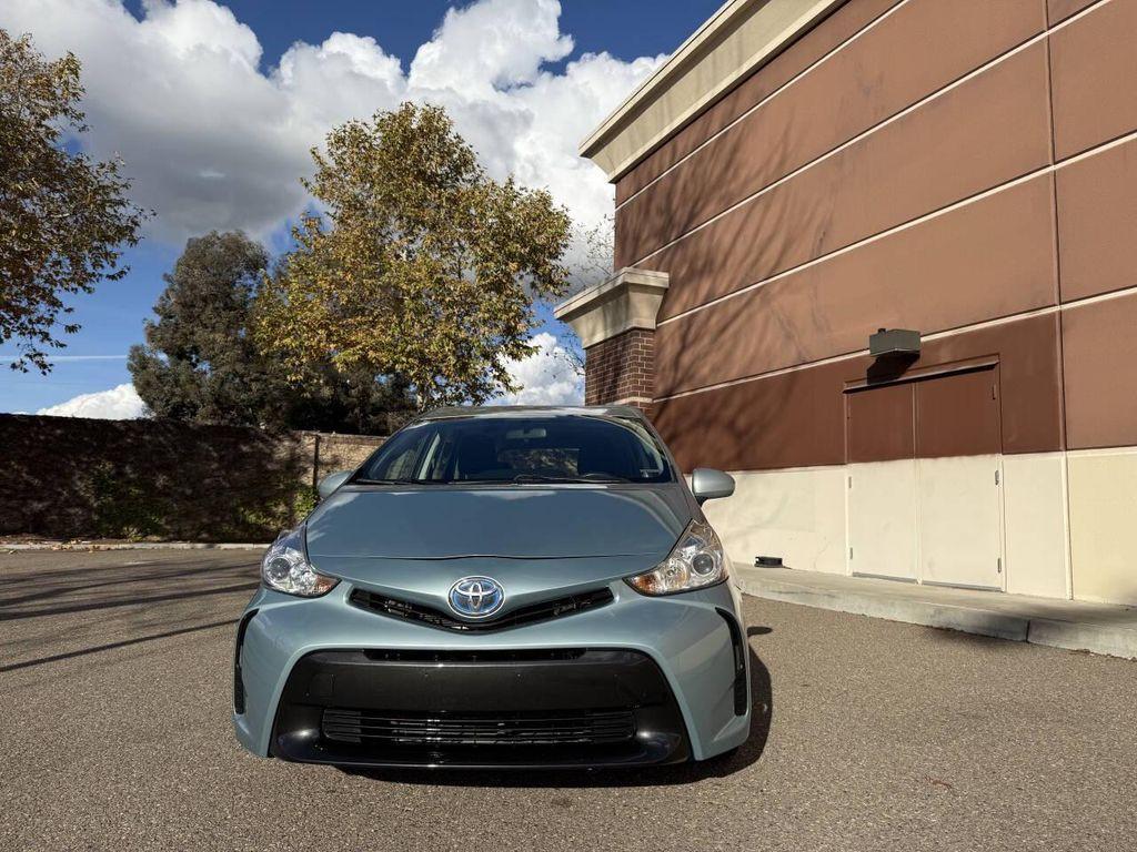 used 2015 Toyota Prius v car, priced at $10,999