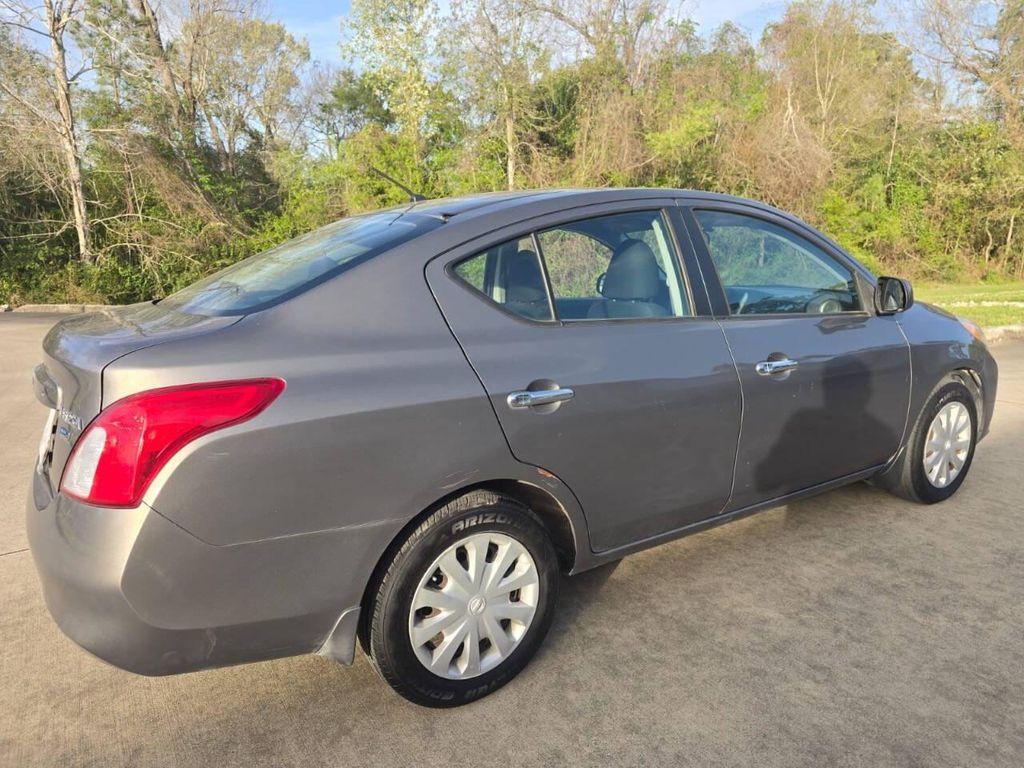 used 2012 Nissan Versa car, priced at $6,900