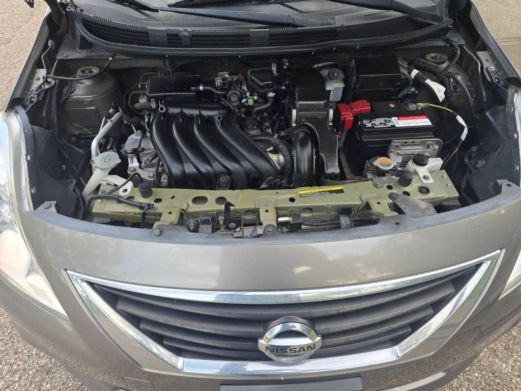 used 2012 Nissan Versa car, priced at $6,900