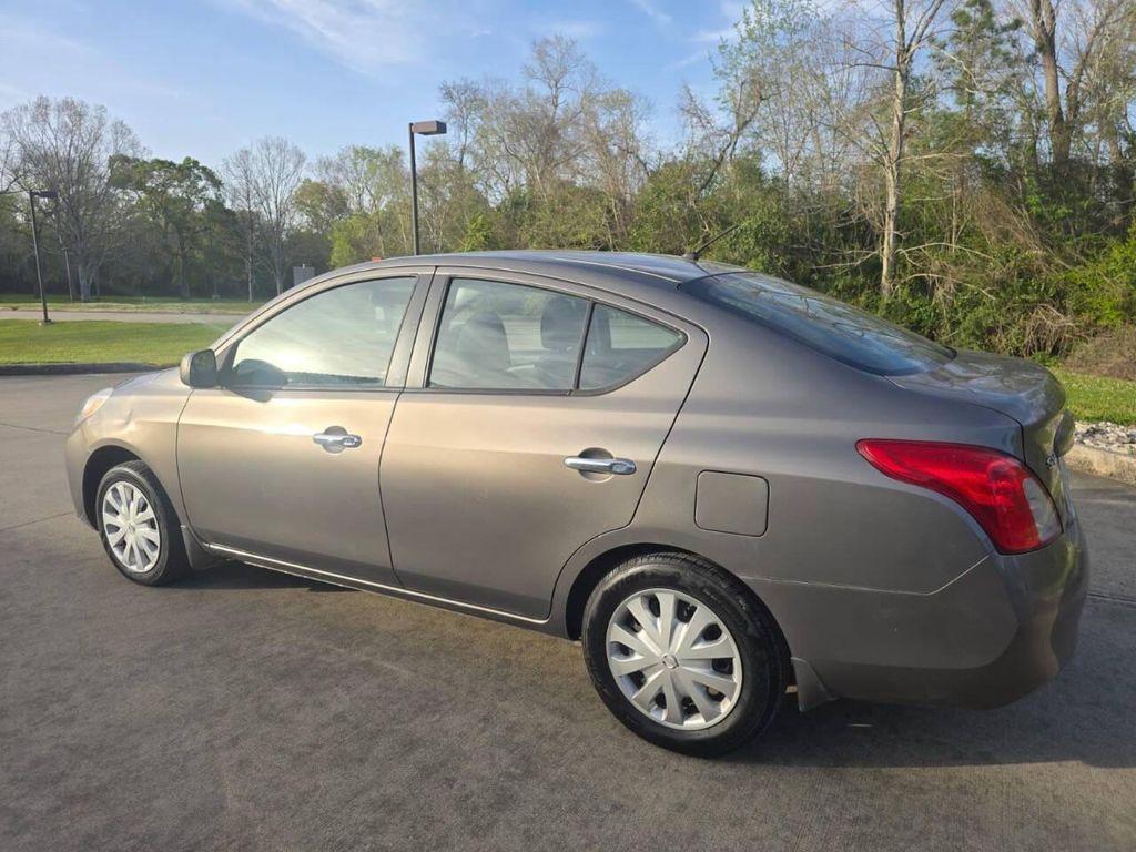 used 2012 Nissan Versa car, priced at $6,900