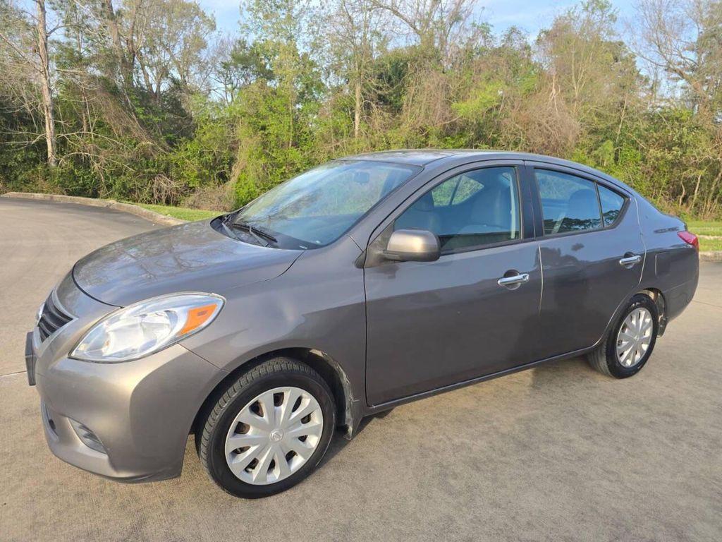used 2012 Nissan Versa car, priced at $6,900