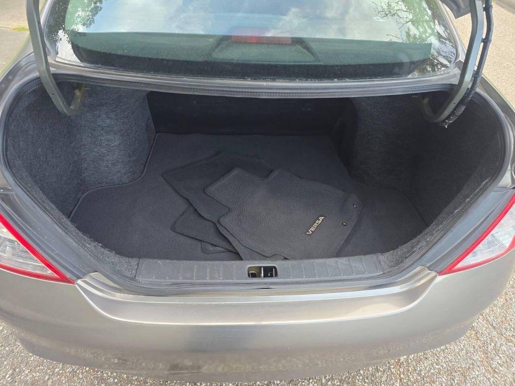 used 2012 Nissan Versa car, priced at $6,900