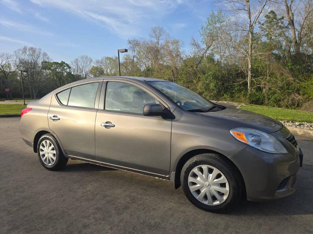 used 2012 Nissan Versa car, priced at $6,900