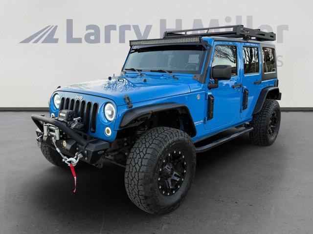 used 2011 Jeep Wrangler Unlimited car, priced at $15,376
