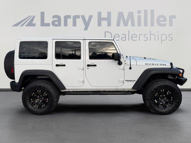 used 2015 Jeep Wrangler Unlimited car, priced at $25,856