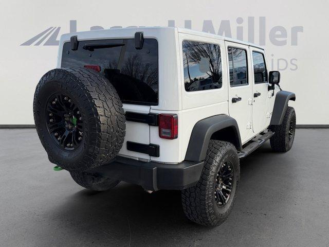 used 2015 Jeep Wrangler Unlimited car, priced at $25,856