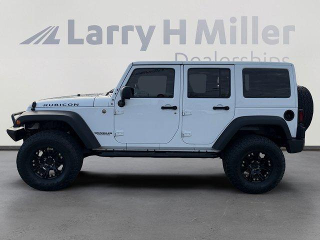 used 2015 Jeep Wrangler Unlimited car, priced at $25,856