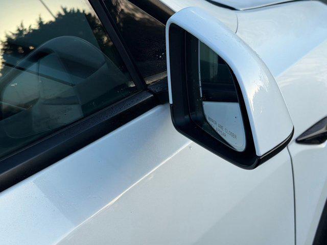 used 2024 Tesla Model Y car, priced at $35,498