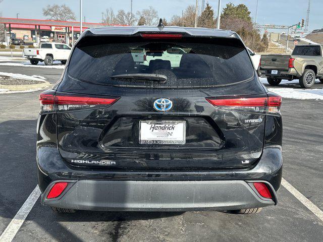used 2021 Toyota Highlander Hybrid car, priced at $29,245