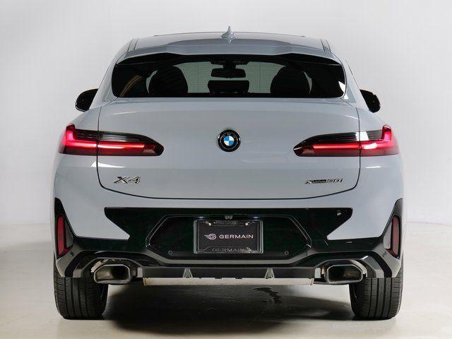 used 2025 BMW X4 car, priced at $52,695