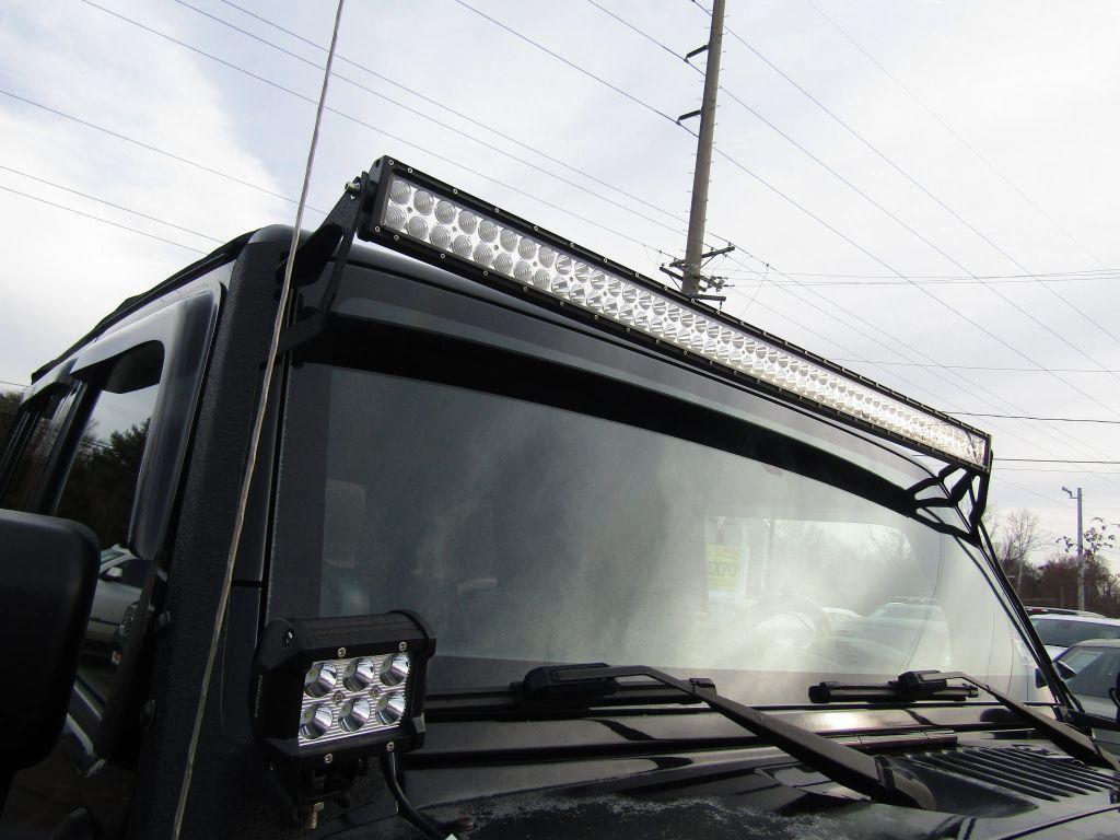 used 2010 Jeep Wrangler Unlimited car, priced at $9,995