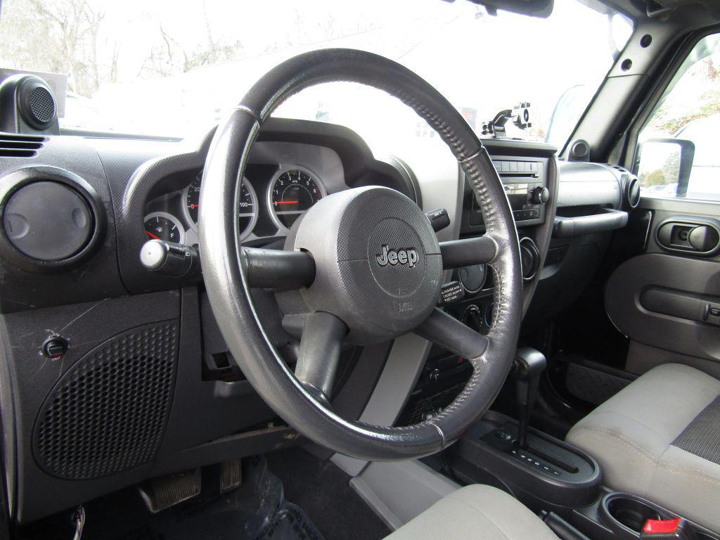 used 2010 Jeep Wrangler Unlimited car, priced at $9,995