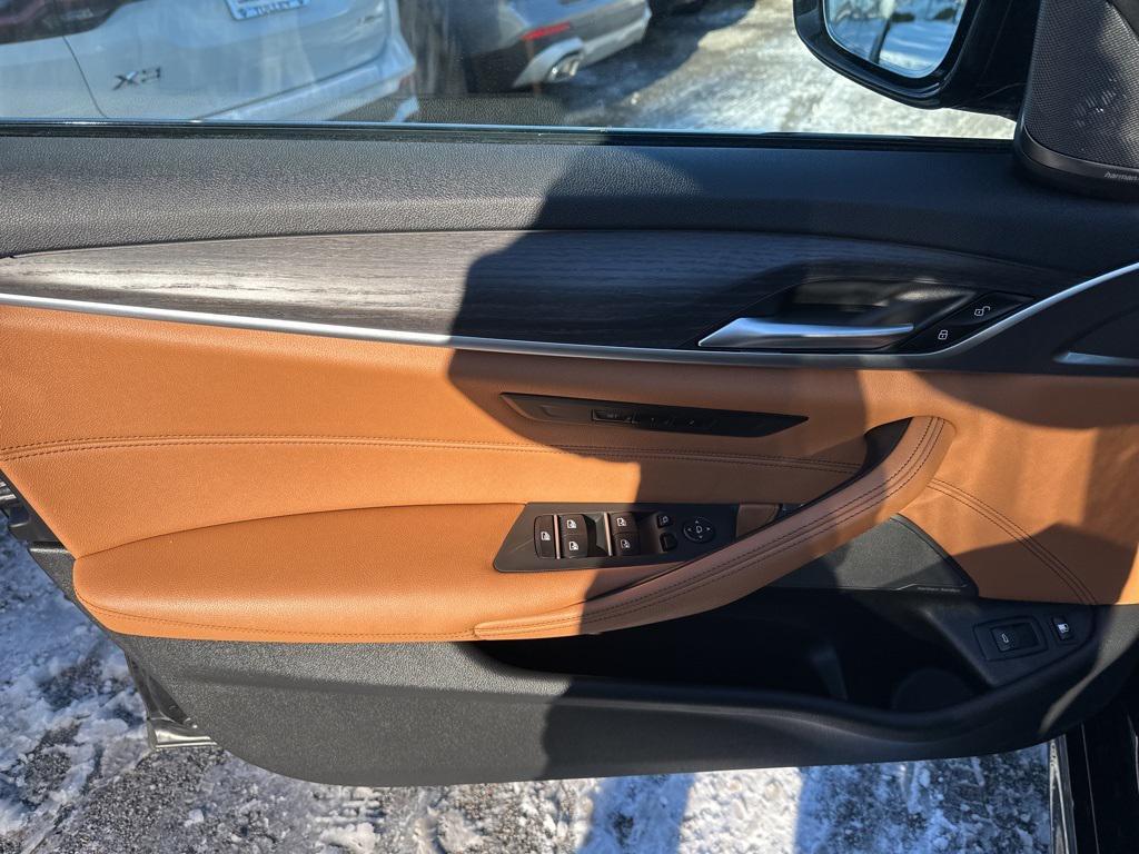 used 2023 BMW 530e car, priced at $39,807