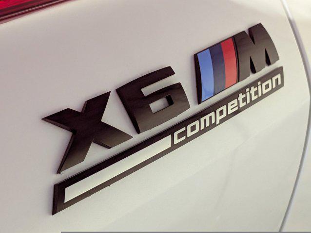 used 2024 BMW X6 M car, priced at $110,501