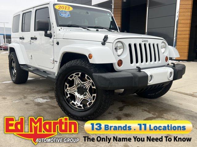 used 2013 Jeep Wrangler Unlimited car, priced at $15,774