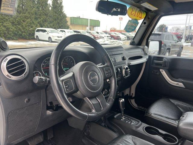 used 2013 Jeep Wrangler Unlimited car, priced at $15,774
