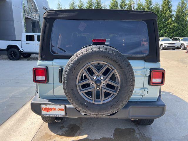 used 2024 Jeep Wrangler car, priced at $33,878