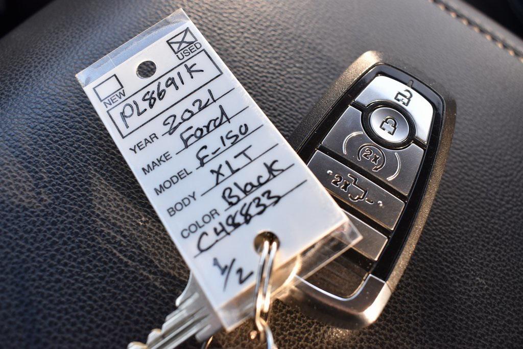 used 2021 Ford F-150 car, priced at $33,378