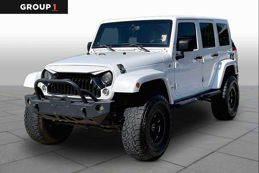 used 2014 Jeep Wrangler Unlimited car, priced at $14,499