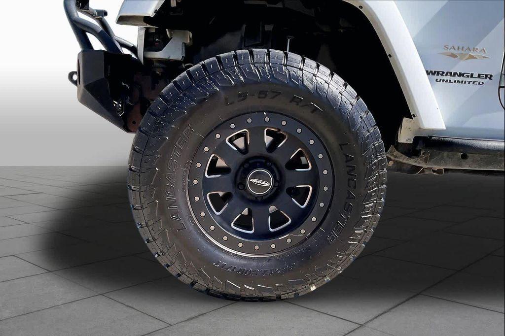 used 2014 Jeep Wrangler Unlimited car, priced at $14,499