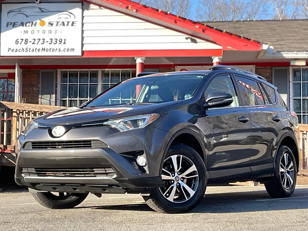 used 2018 Toyota RAV4 car, priced at $15,985