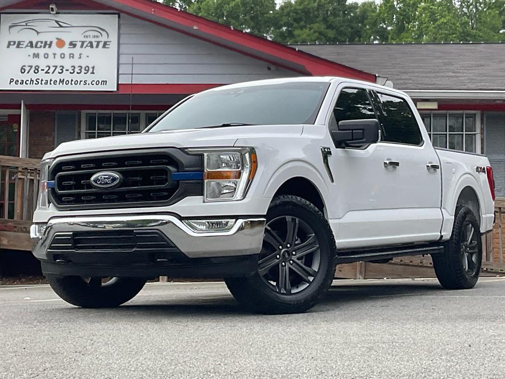 used 2021 Ford F-150 car, priced at $27,384