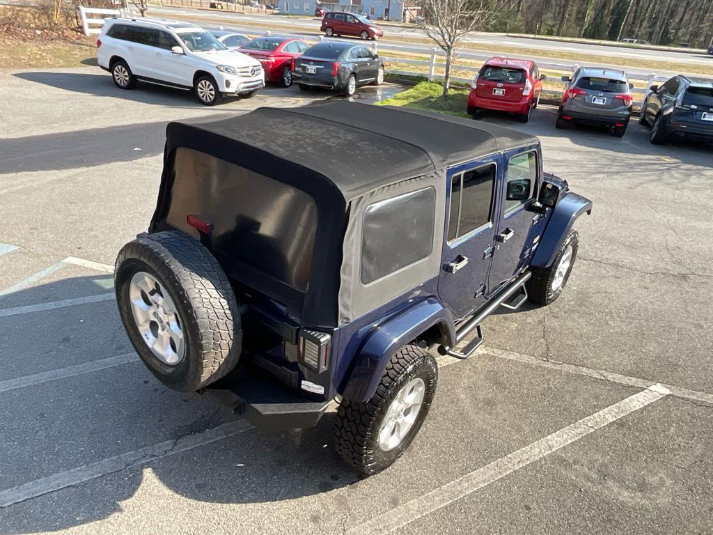 used 2013 Jeep Wrangler Unlimited car, priced at $11,985