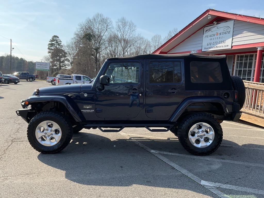 used 2013 Jeep Wrangler Unlimited car, priced at $11,985