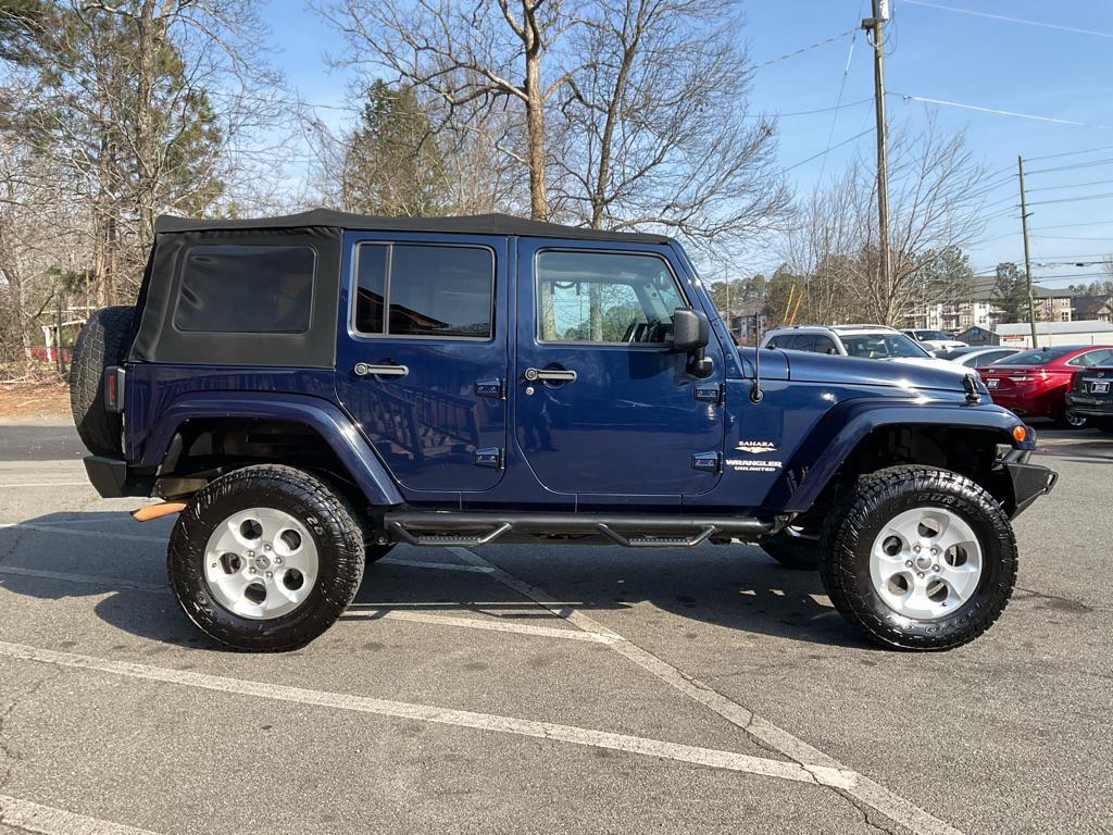 used 2013 Jeep Wrangler Unlimited car, priced at $11,985