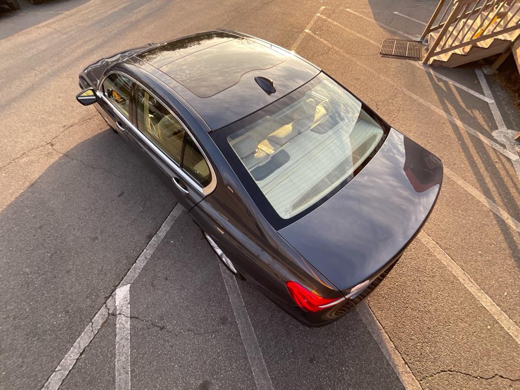 used 2016 BMW 740 car, priced at $18,985