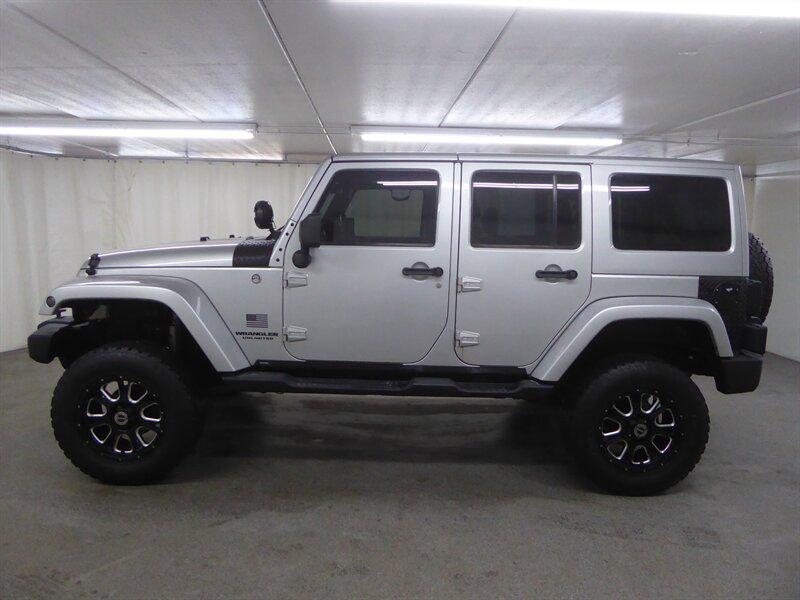 used 2011 Jeep Wrangler Unlimited car, priced at $11,000
