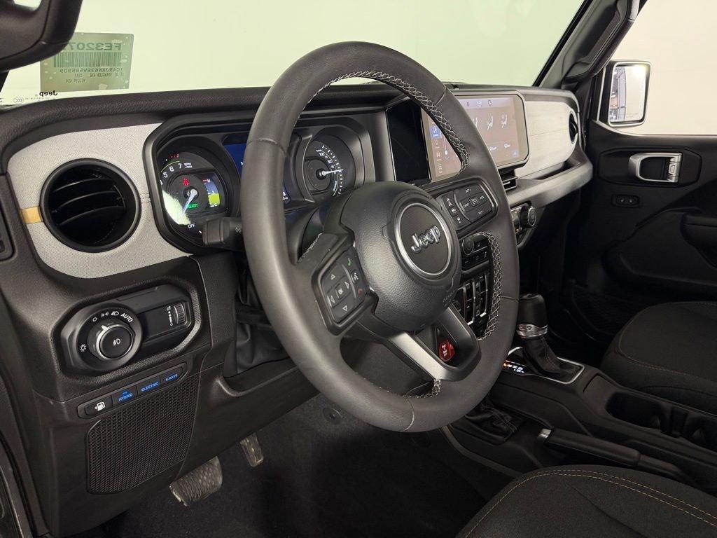 used 2025 Jeep Wrangler 4xe car, priced at $30,872