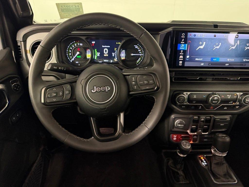 used 2025 Jeep Wrangler 4xe car, priced at $30,872