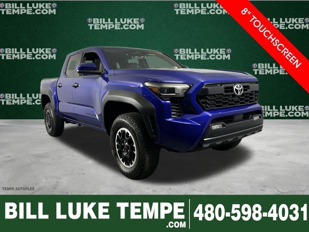 used 2025 Toyota Tacoma car, priced at $38,273