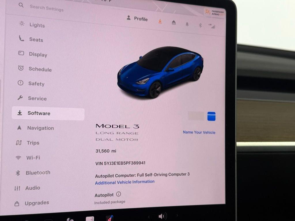 used 2023 Tesla Model 3 car, priced at $31,373