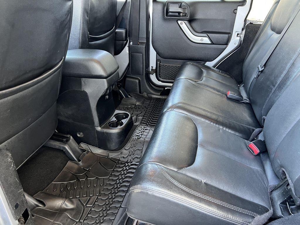used 2013 Jeep Wrangler Unlimited car, priced at $14,597