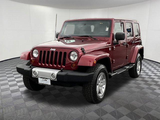 used 2012 Jeep Wrangler Unlimited car, priced at $13,997