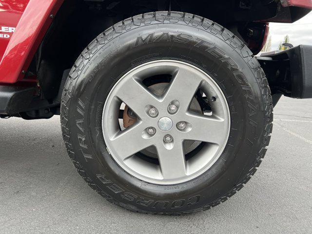 used 2012 Jeep Wrangler Unlimited car, priced at $13,997