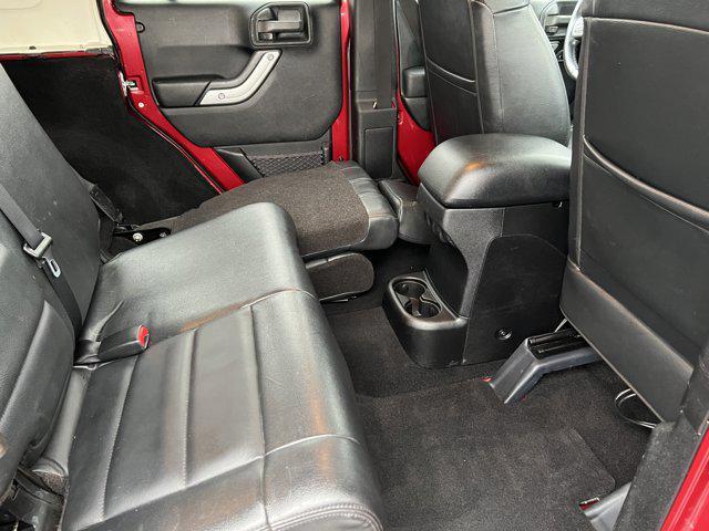 used 2012 Jeep Wrangler Unlimited car, priced at $13,997