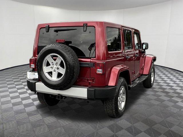 used 2012 Jeep Wrangler Unlimited car, priced at $13,997