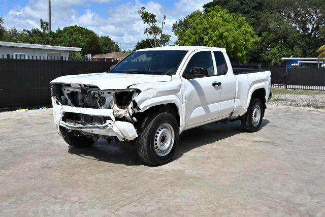 used 2024 Toyota Tacoma car, priced at $9,780