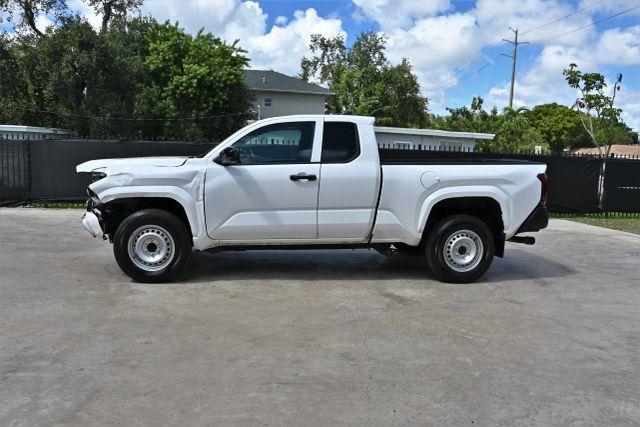 used 2024 Toyota Tacoma car, priced at $9,780