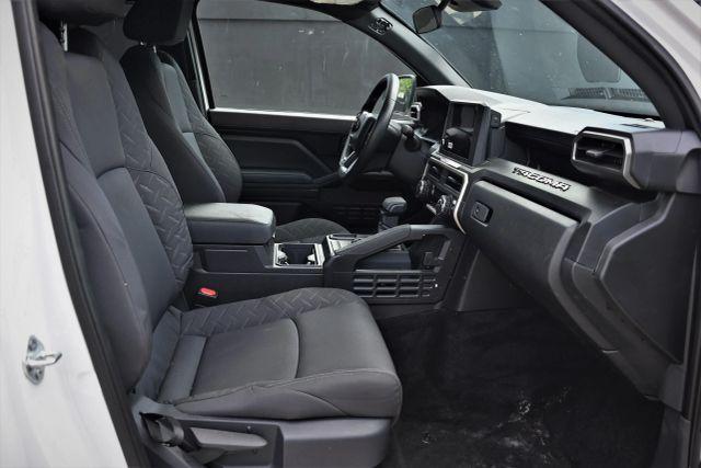 used 2024 Toyota Tacoma car, priced at $9,780