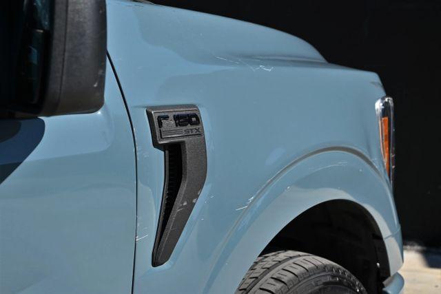 used 2023 Ford F-150 car, priced at $14,480