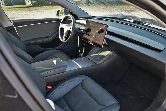 used 2025 Tesla Model 3 car, priced at $16,480