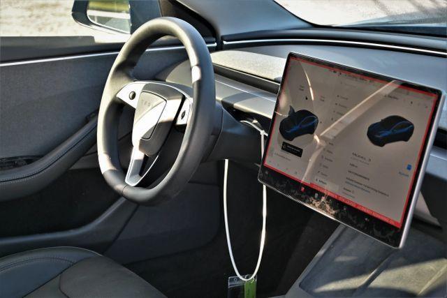 used 2025 Tesla Model 3 car, priced at $16,480