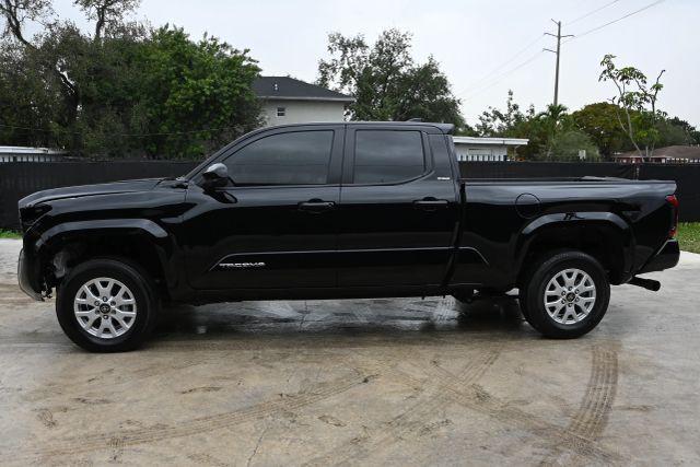 used 2024 Toyota Tacoma car, priced at $17,980