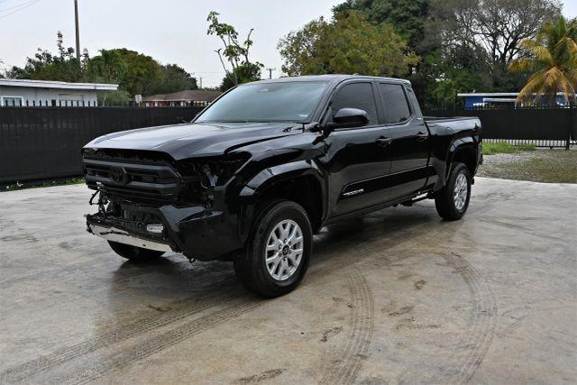 used 2024 Toyota Tacoma car, priced at $17,980